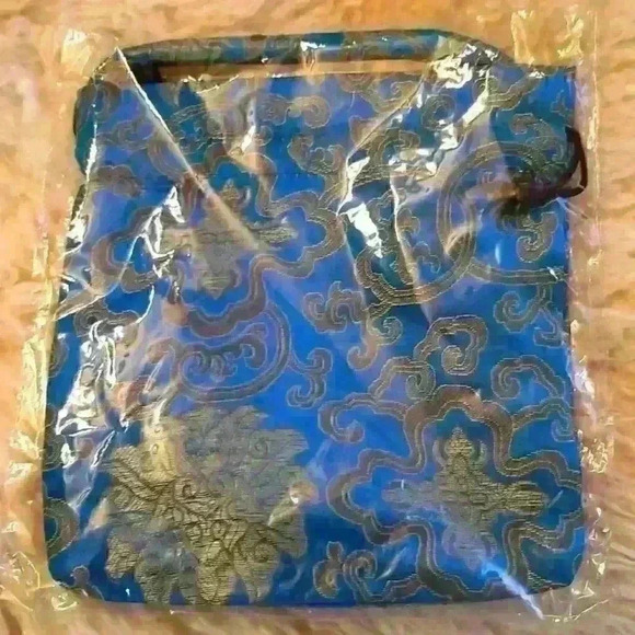 None Handbags - Small silk bag with handle and drawstring